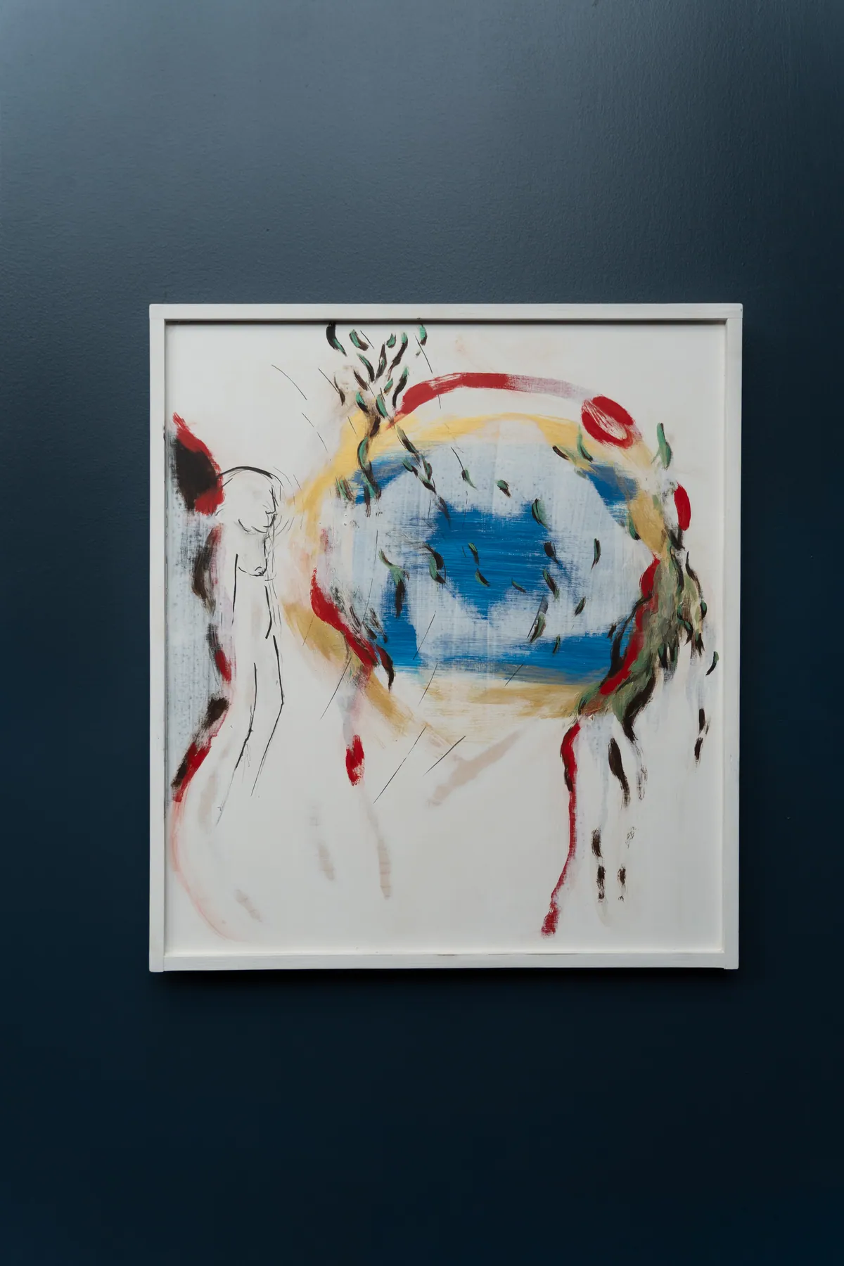 The framed white panel on a dark navy wall at TolHouse